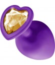 Fialový silikonový anální kolík se zlatým drahokamem ve tvaru srdce 8 x 3,5 cm.