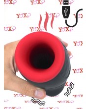 Mužsky vibrační a zahřívací masturbátor ve tvaru úst v čistém silikonu s proměnlivým tlakem.